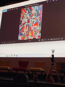 Slide de la conférence : tableau Usine et Congés Payés de l'artiste Roland Venner